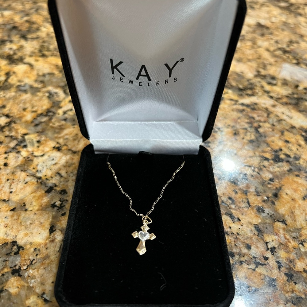 - Kay’s baby cross necklace 14k gold